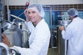 bigstock-Portrait-of-a-smiling-scientis-80713958
